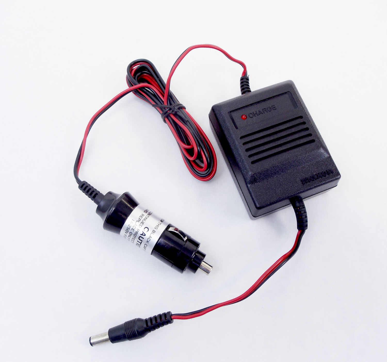 MAXON -  12 VOLT VEHICULAR CHARGER FOR 27LP & OTHER HAND HELD RADIOS. CHARGES NICAD BATTERIES IN UNIT, 2.1 MM PLUG
